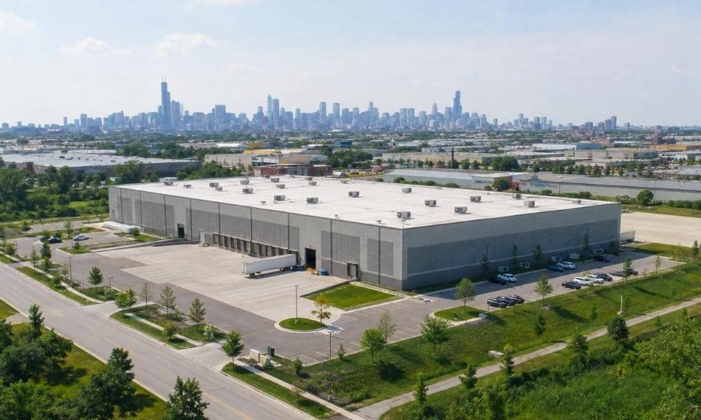 Aerial view of a Chicago commercial property with loading areas and parking, shown for an ALTA survey before a sale-leaseback transaction