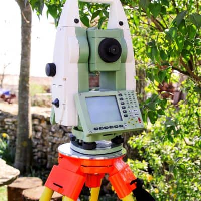 Total station used during an elevation survey to measure property grading levels